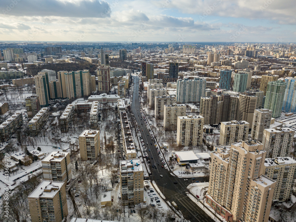 Obraz premium Snowy Kiev. Aerial drone view. Winter sunny morning.