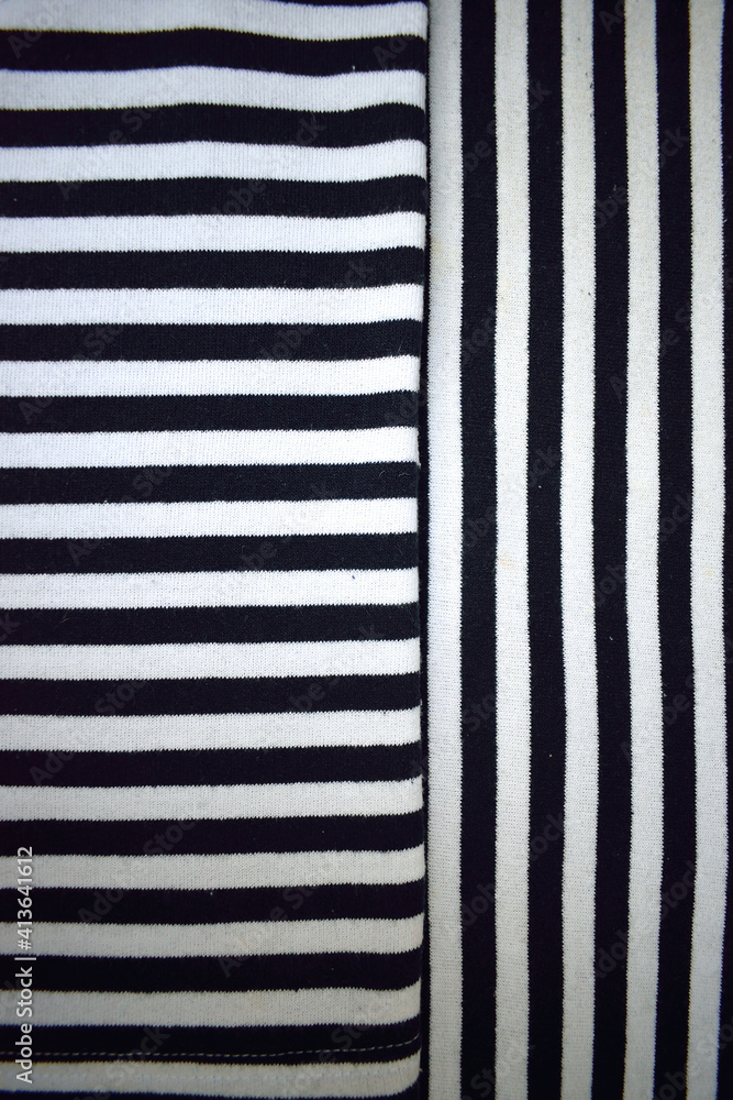 Fototapeta premium stripes black and white horizontally and vertically as a texture for the background
