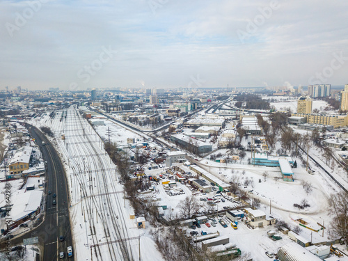 Snowy industrial area of Kiev. Aerial drone view. Winter snowy day.