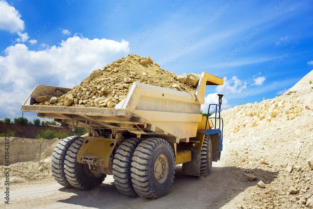 Obraz premium A large quarry dump truck loaded with rock.