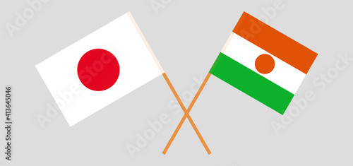 Crossed flags of Japan and the Niger