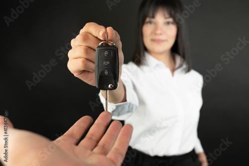 Woman with a car keys. 