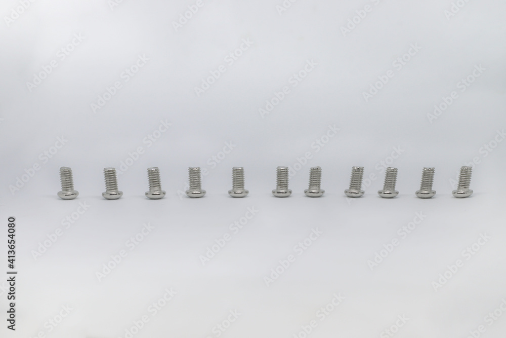 Photo shoot of screws on white background. Variety of screws. Product photos. Photo shoot of screws on white background. Variety of screws. Product photos.