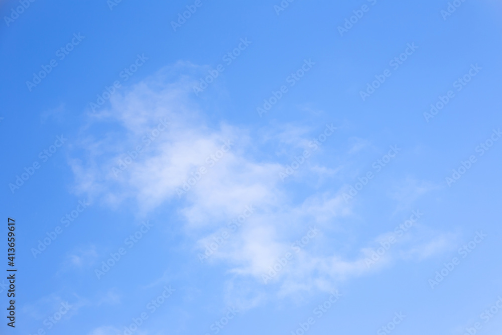 white clouds against a blue sky, winter day white clouds against a blue sky, winter day