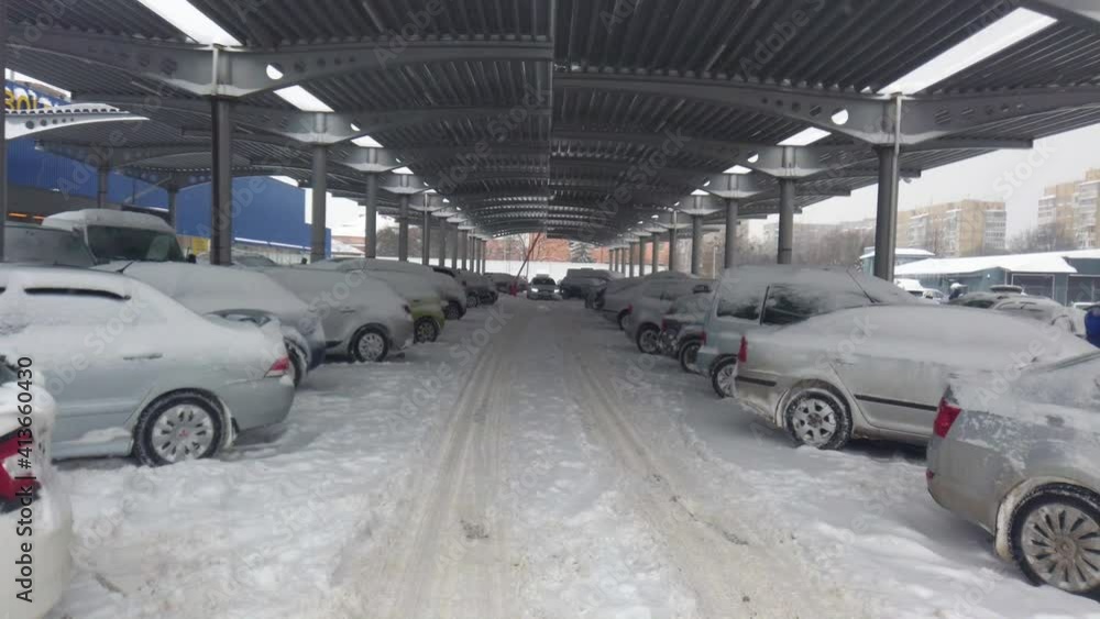 Cars in the parking during a blizzard. Cars in the parking during a blizzard.