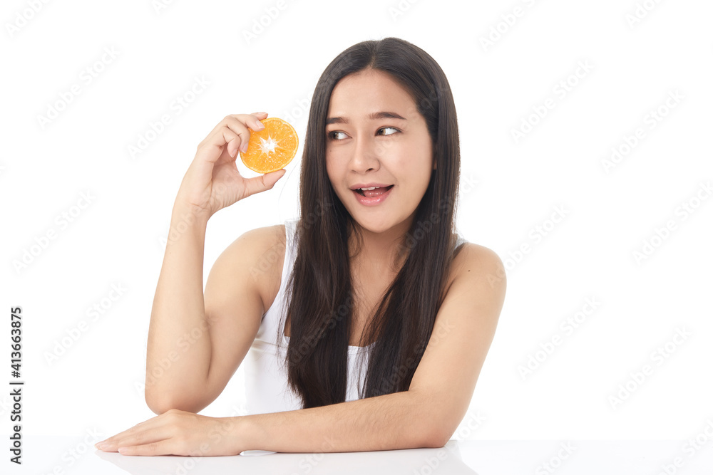Portrait of a beautiful young woman with orange Portrait of a beautiful young woman with orange