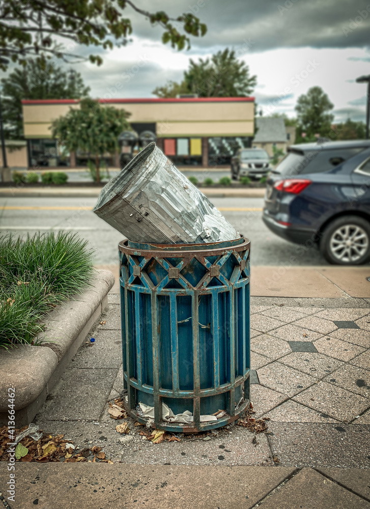 Funny Portrait of a Trash Can Being Thrown Away Inside of a Larger Trash Can Funny Portrait of a Trash Can Being Thrown Away Inside of a Larger Trash Can