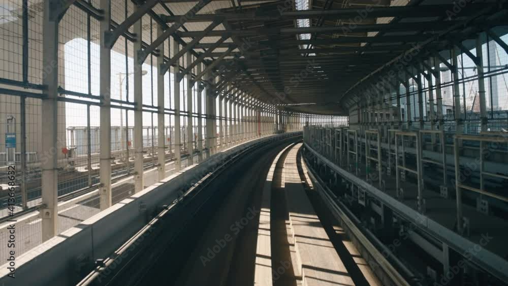 Sunlight Passing Through Metal Frame Walls As The Yurikamome Monorail Travelling In Tunnel Line Under Rainbow Bridge In Tokyo, Japan. - POV Sunlight Passing Through Metal Frame Walls As The Yurikamome Monorail Travelling In Tunnel Line Under Rainbow Bridge In Tokyo, Japan. - POV