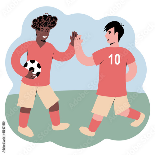 Soccer players highfive each other on a football field