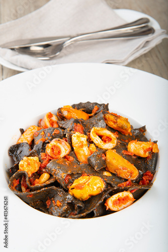 Squid ink pasta with seafood sauce