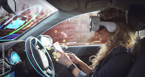 Animation of emoji icons over woman wearing vr headset in self driving car photo