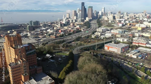 Cinematic aerial drone dolly footage of Pacific Tower, First Hill, Yesler Terrace, Atlantic, Cherry Hill, Squire Park, skyscrapers and high-rise commercial and residential buildings downtown Seattle photo