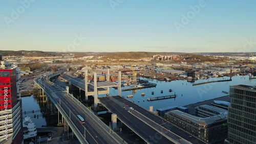 New And Old Bridge Over Gota Alv River In Gothenburg, Sweden During Pandemic. - aerial photo