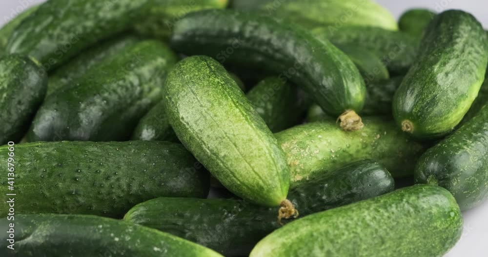 Rotation of a heap of ripe green cucumber. Rotation of a heap of ripe green cucumber.