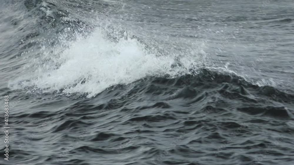 Wave Cresting Over and Splashing off Shore of Fernandina Island, Galapagos Wave Cresting Over and Splashing off Shore of Fernandina Island, Galapagos