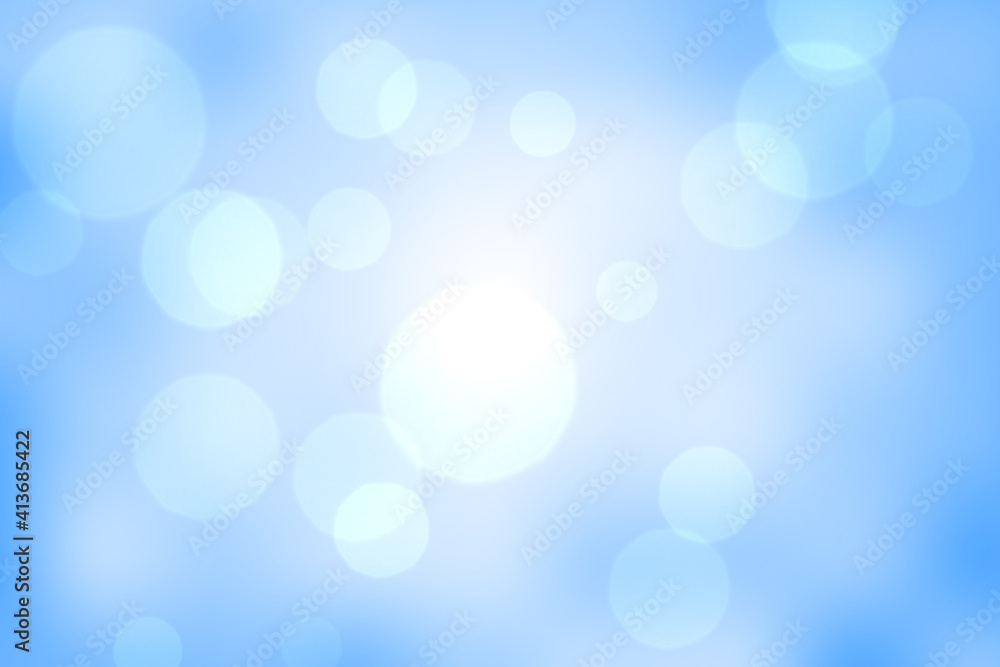 Abstract illustration of bokeh spots of light against blue background Abstract illustration of bokeh spots of light against blue background