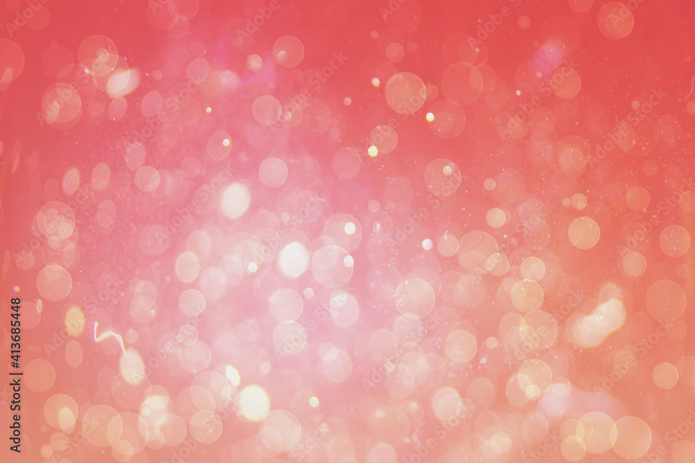 Abstract illustration of bokeh spots of light against orange background Abstract illustration of bokeh spots of light against orange background