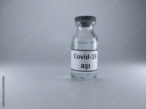 Covid 19 vaccine written in Turkish language on a vaccine bottle 
