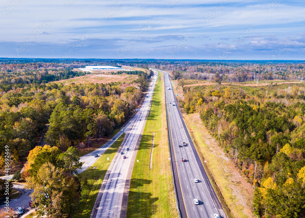 Highway. Aerial view on road or freeway. The Best American roads. Vacation trip. The road stretching beyond the horizon.  