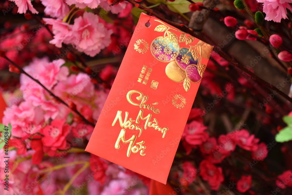 Vietnamese Tet Lunar New Year Lucky Money Envelope with Pink Flowers, Warm Hues Vietnamese Tet Lunar New Year Lucky Money Envelope with Pink Flowers, Warm Hues