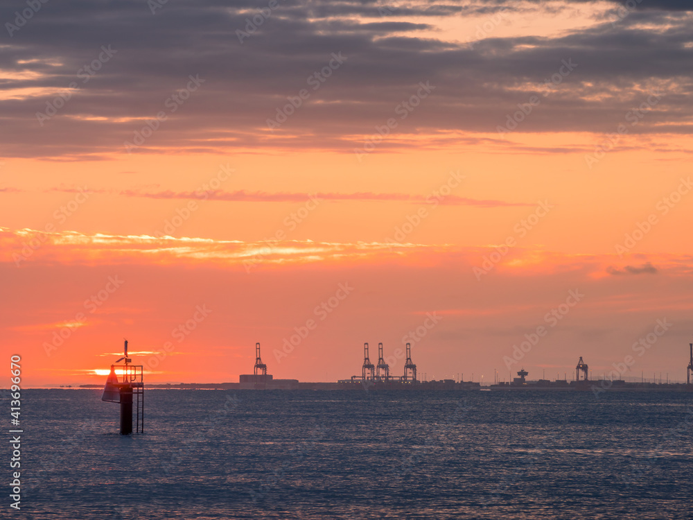 Sunrise Over Sea with Port