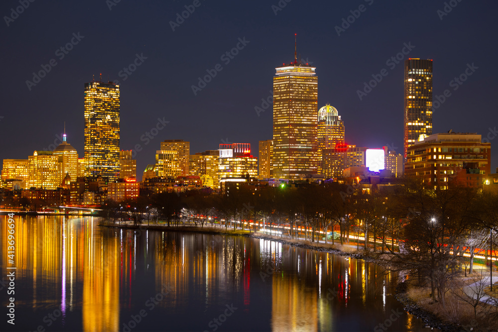 Boston Skyline at night from Boston University Bridge, Boston, Massachusetts, USA. City of Cambridge is on the left and Boston Back Bay is on the right in this photo. 