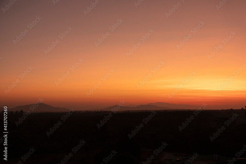 Morning blur over mountains and trees. The first and last light of the day in sky with beautiful Morning blur over mountains and trees. The first and last light of the day in sky with beautiful