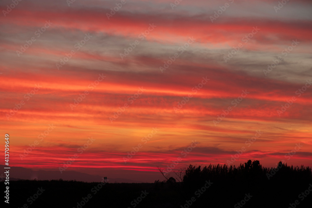 Morning blur over mountains and trees. The first and last light of the day in sky with beautiful, Sunshine in morning time.