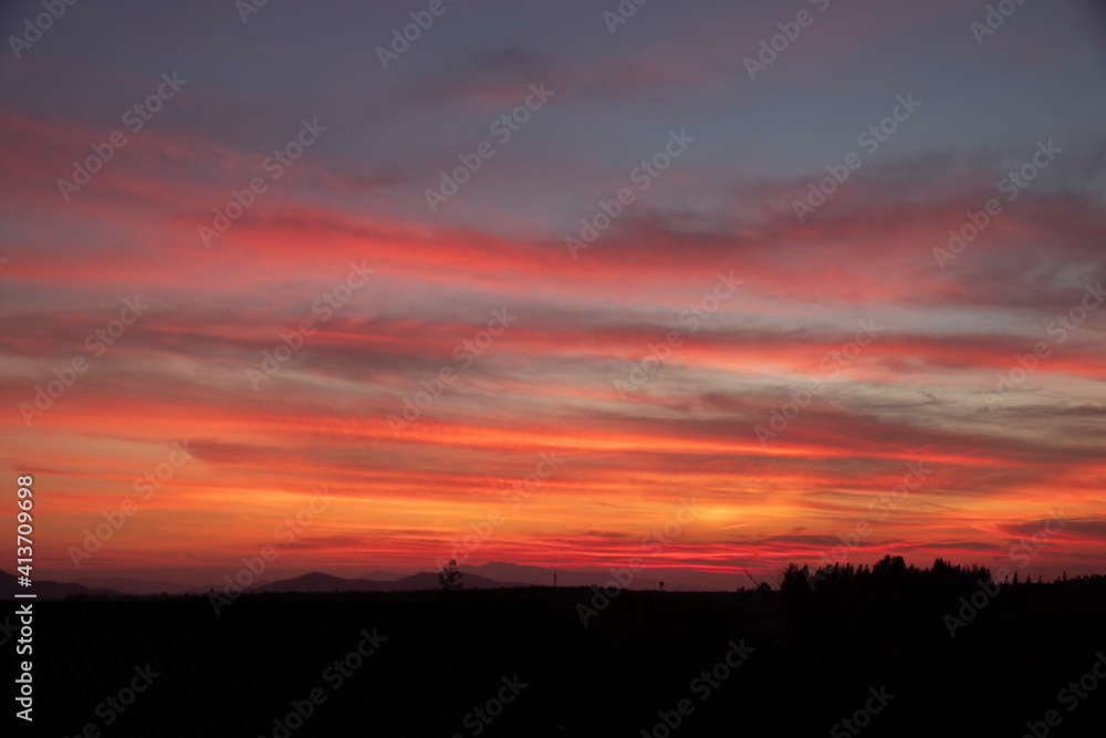 Morning blur over mountains and trees. The first and last light of the day in sky with beautiful Morning blur over mountains and trees. The first and last light of the day in sky with beautiful