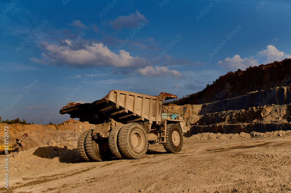 Obraz premium truck bulldozer sand construction work outdoors blue sky summer