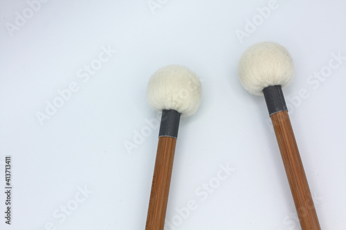 Tableau sur toile Detail of timpani mallets on a white background.