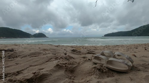 Time lapse at Trindade beach, Rio de Janeiro, Brazil as the clouds move slowly. photo