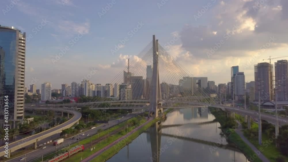 flight over Pinheiro river with a gorgeous view of estaiada bridge on a busy day with traffic and beautiful sunset flight over Pinheiro river with a gorgeous view of estaiada bridge on a busy day with traffic and beautiful sunset