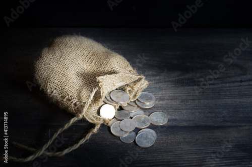 фотографія sack with the thirty silver coins biblical symbol of the betrayal of judas