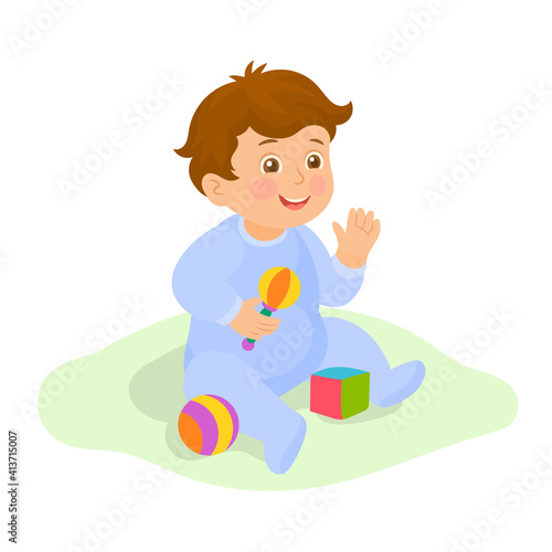 Little boy with baby toys 