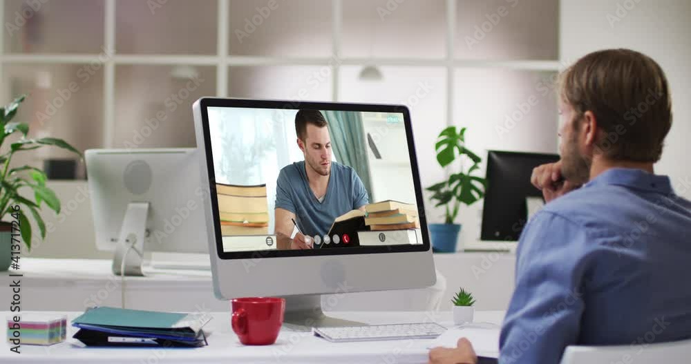 Caucasian male teacher using computer on video call with male student Caucasian male teacher using computer on video call with male student
