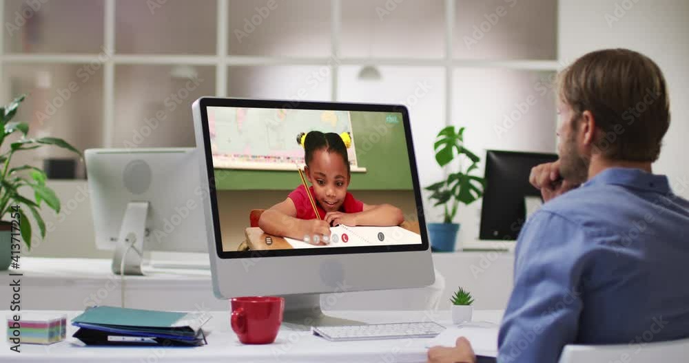 Caucasian male teacher using computer on video call with schoolgirl Caucasian male teacher using computer on video call with schoolgirl