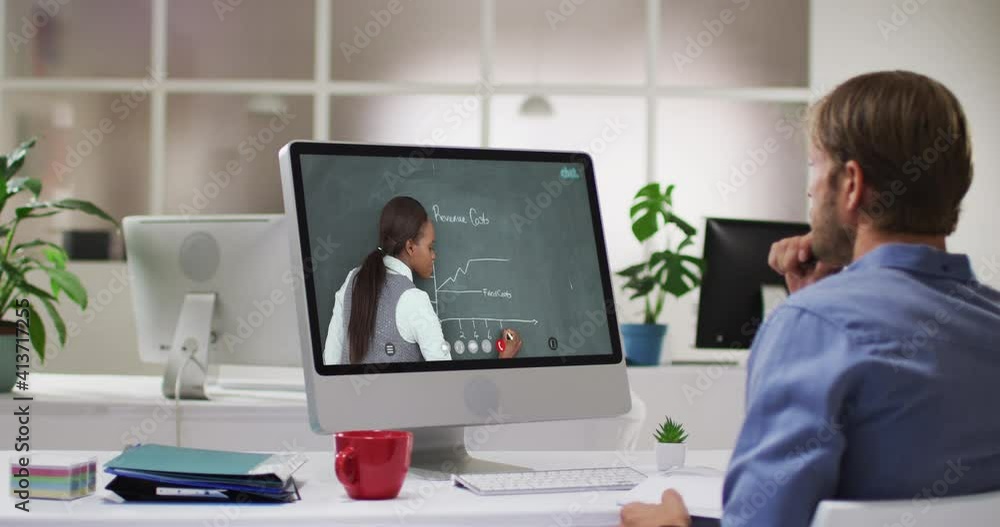 Caucasian male student using computer on video call with female teacher