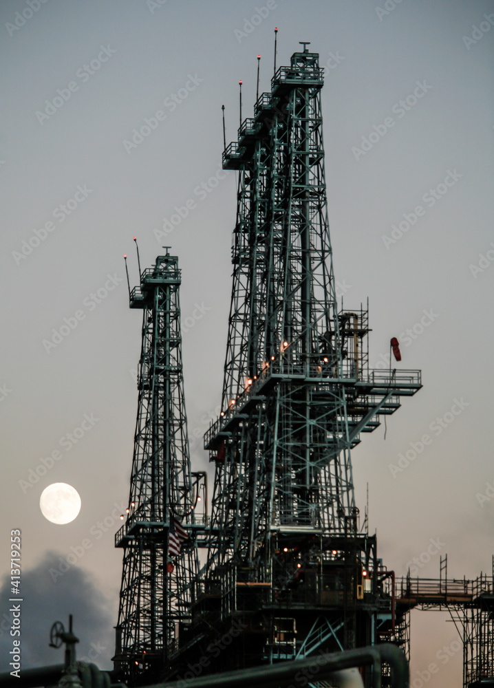 Low angle view of industrial building against sky at dusk Low angle view of industrial building against sky at dusk