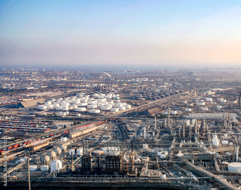 Aerial view of oil refinery factory against sky