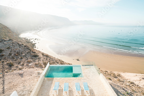 High angle scenic view of tourist resort by sea against sky photo