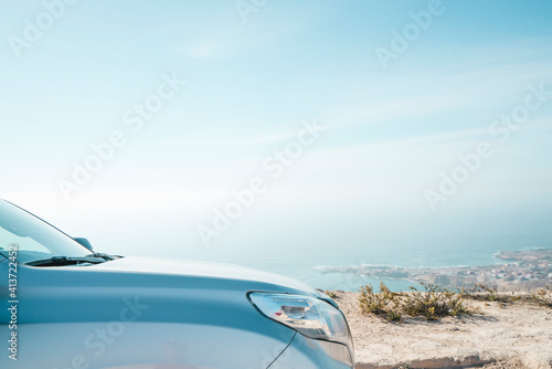 Close-up of car against sea and sky photo