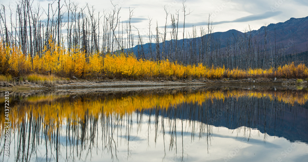 Scenic view of river during autumn against mountains Scenic view of river during autumn against mountains