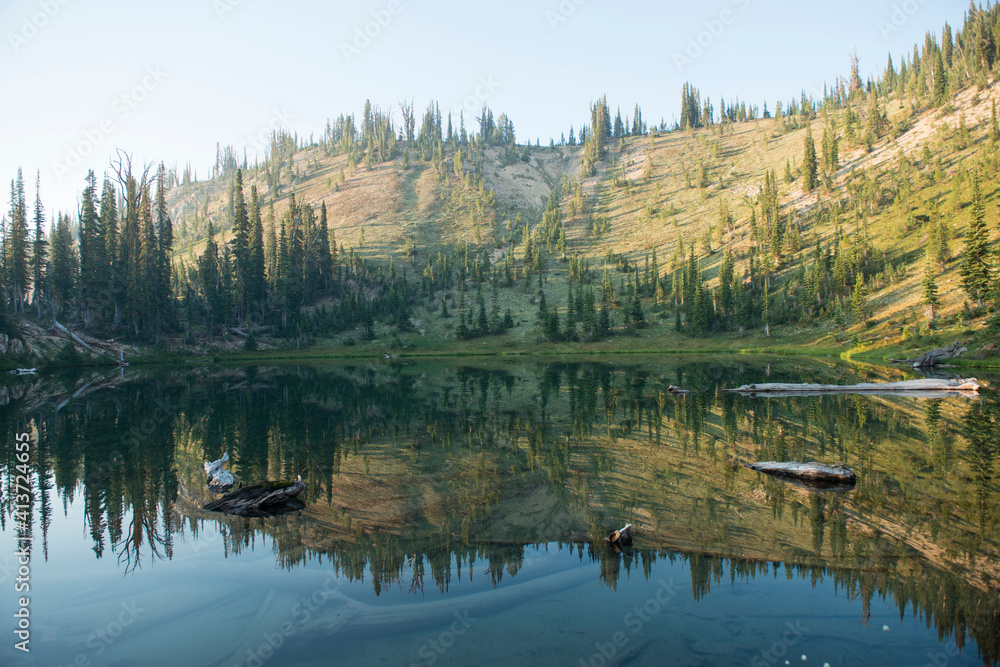 Scenic view of lake by mountain against sky Scenic view of lake by mountain against sky