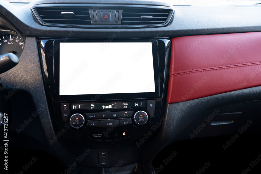 Monitor in car with isolated blank screen use for navigation maps and GPS. Isolated on white with clipping path. Car detailing. Car display with blank screen. Modern car red leather interior details.