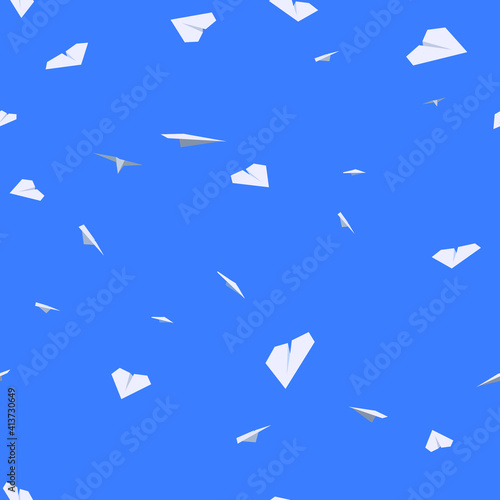 seamless pattern of white paper airplanes on blue background