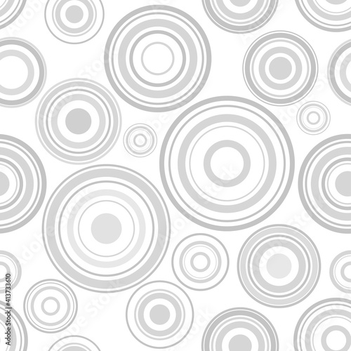 Circles seamless pattern. Blue circles on a white background. Trendy geometric design.