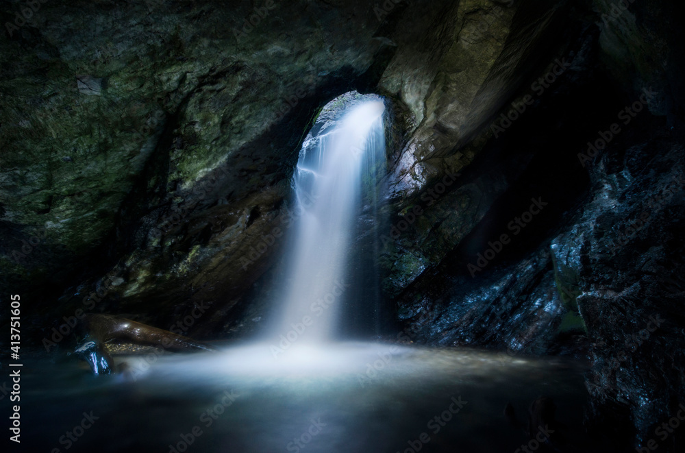 Scenic view of Donut Falls in cave Scenic view of Donut Falls in cave