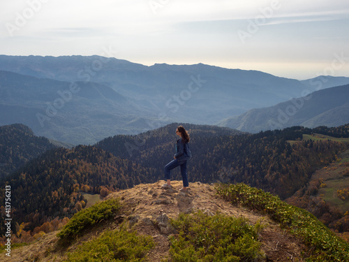 Hiking in the mountains, Enjoy the freedom at the top. Young female