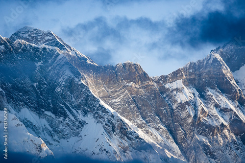 Mount Everest seen though the clouds, Khumbu Region, Nepal Himalay photo